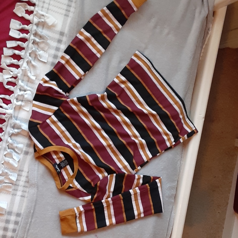 A tight striped long sleeve shirt